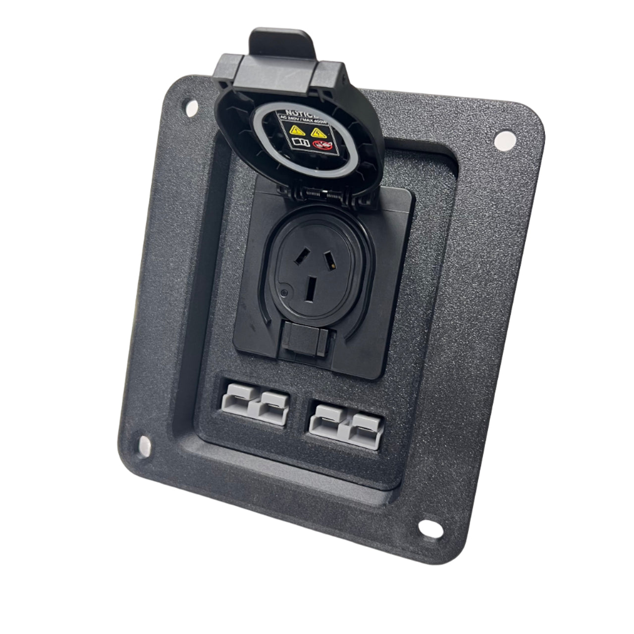 Black accessory panel with a 240V socket with protective cover open and two 50A anderson plugs on a white surface
